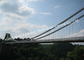 Q345bの現代吊り橋のプレハブの鋼鉄構造十字の川ケーブル橋 サプライヤー